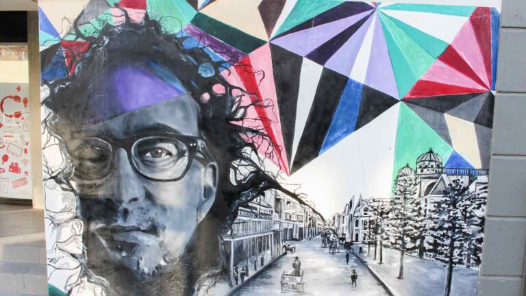 Street art man with glasses